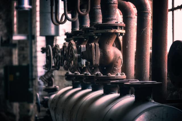 Frozen Boiler Condensate Pipes; rusty exterior boiler pipes